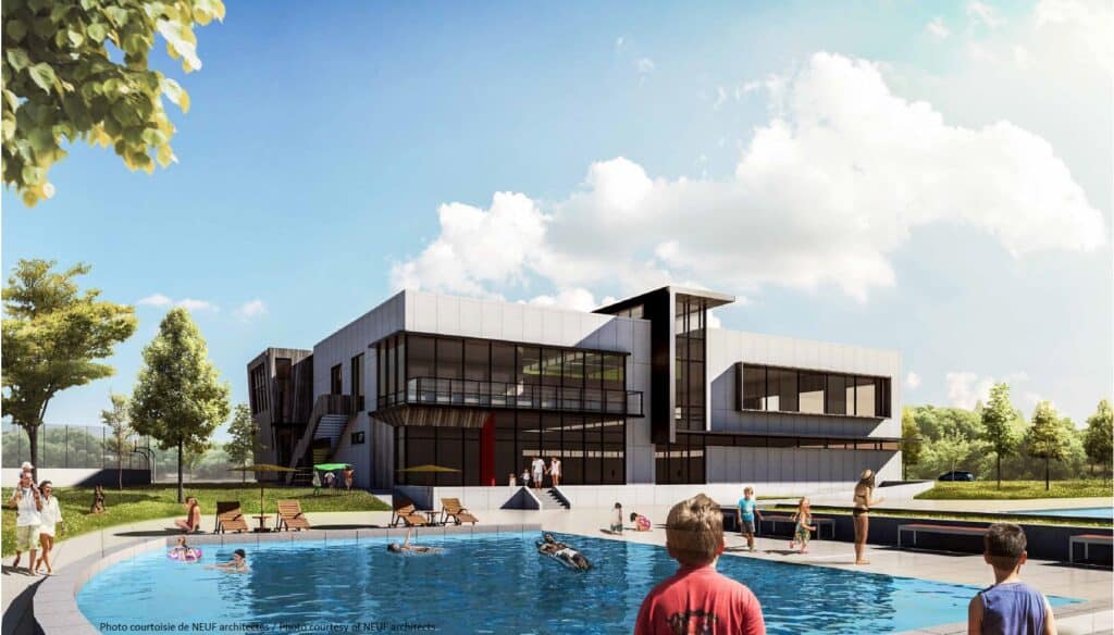 Outdor swimming pool in front of a modern community centre building